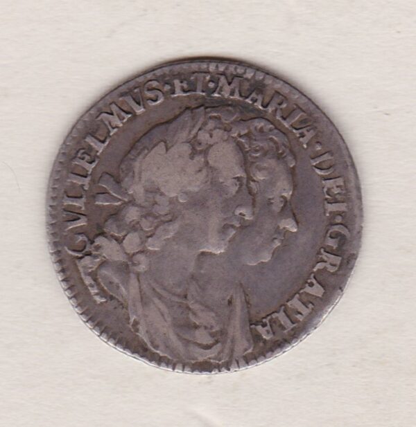 1693 silver sixpence coin featuring the conjoined busts of William III and Mary II on the Obverse. Crowned shields around Nassau lion on the Reverse.