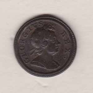 1717 copper farthing coin featuring the laureate bust of King George I on the Obverse. Britannia seated facing left on the Reverse.