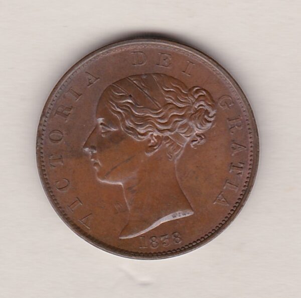 1838 copper halfpenny coin featuring young head Queen Victoria on the Obverse. Britannia seated facing right holding a trident on the Reverse. 