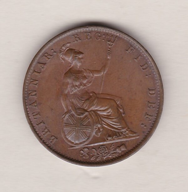 1838 copper halfpenny coin featuring young head Queen Victoria on the Obverse. Britannia seated facing right holding a trident on the Reverse. 