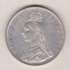 1889 silver double florin coin featuring the Jubilee Head design of Queen Victoria. The Garter star and four sceptres in the angles complete the Reverse.