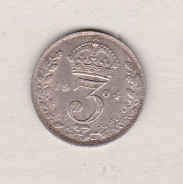 1904 Silver Threepence coin featuring the portrait of King Edward VII on the Obverse. The Reverse features a crowned denomination dividing the date.