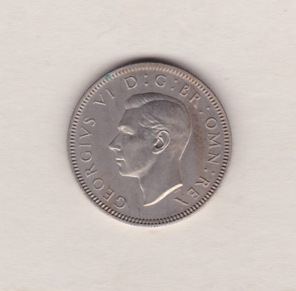 1950 cupro nickel proof Scottish shilling coin featuring King George VI on the Obverse. The crowned Scottish lion appears on the Reverse.