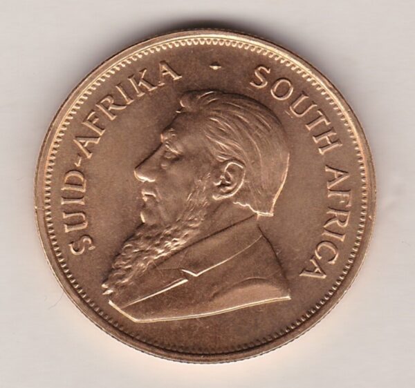 1975 South Africa Gold One Ounce Krugerrand. Investment one ounce gold coin featuring Paul Kruger on the Obverse. The springbok on the Reverse.