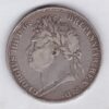 1821 Secundo Silver Crown Coin featuring King George IIII on the Obverse and the St George slaying the dragon design on the reverse.