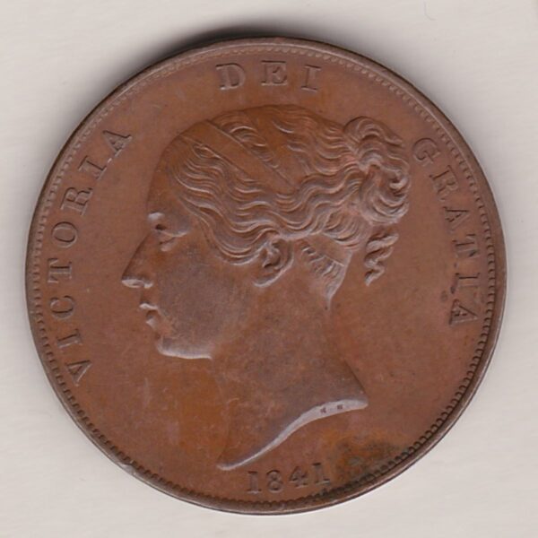 1841 copper penny coin featuring the young head portrait of Queen Victoria on the Obverse. The coin depicts Britannia seated to the right on the Reverse.