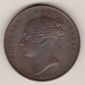 1848 copper penny coin featuring the young head portrait of Queen Victoria on the Obverse. The coin depicts Britannia seated to the right on the Reverse.