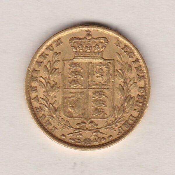 1860 Gold Sovereign Coin. The coin features a young head queen Victoria on the Obverse and the collectable shield design on the Reverse.