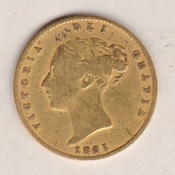 1861 Gold Half Sovereign Coin featuring Queen Victoria Young Head on the Obverse and the shield design on the Reverse in a used fair to fine condition.