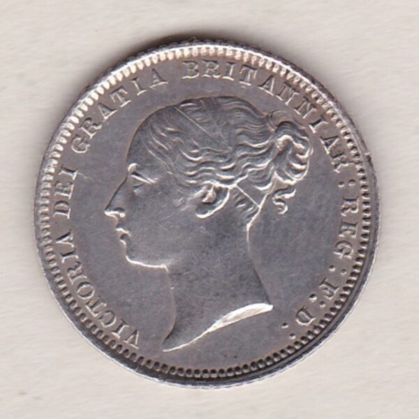 1872 silver sixpence coin featuring young head Queen Victoria on the Obverse. The crowned denomination within a wreath and date below on the Reverse.