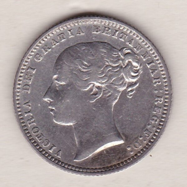 1875 silver shilling coin featuring Queen Victoria young head on the Obverse. The Reverse has a crown, laurel and oak leaves within an open wreath.