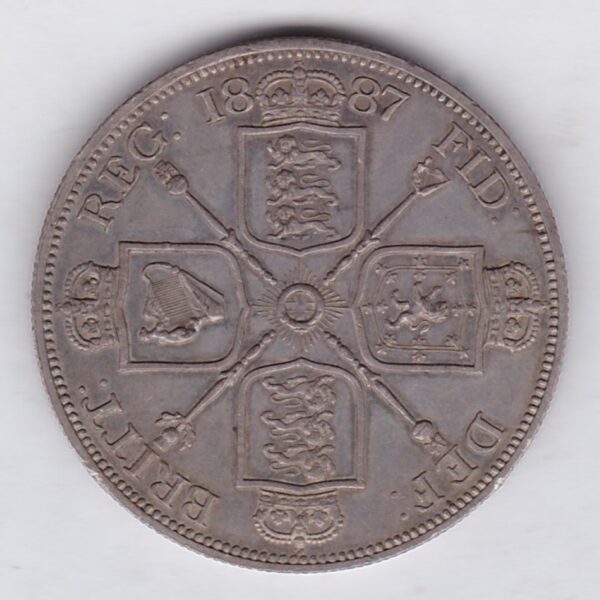 1887 Roman I silver double florin coin featuring the Jubilee Head design of Queen Victoria. With the Garter star and four sceptres in the angles Reverse.