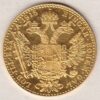 1915 Austria Gold Ducat featuring the portrait of Emperor Franz Joseph I on the Obverse. The double-headed imperial eagle is on the Reverse.