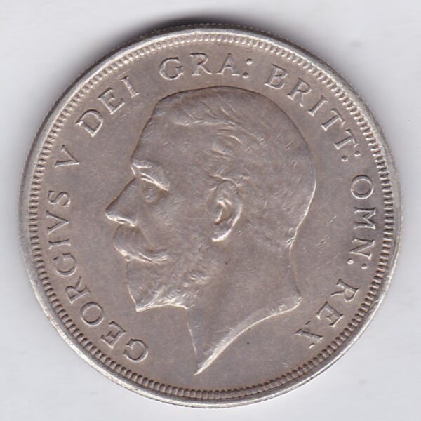 1928 Silver Crown Coin featuring King George V on the Obverse and the wreath design on the reverse. The coin is in extremely fine condition.