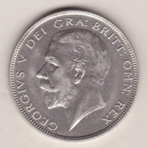 1928 Silver Halfcrown coin featuring the King George V on the Obverse. The Quartered shield of arms flanked by crowned royal cyphers complete the Reverse.