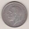 1931 Silver Halfcrown coin featuring the King George V on the Obverse. The Quartered shield of arms flanked by crowned royal cyphers complete the Reverse.