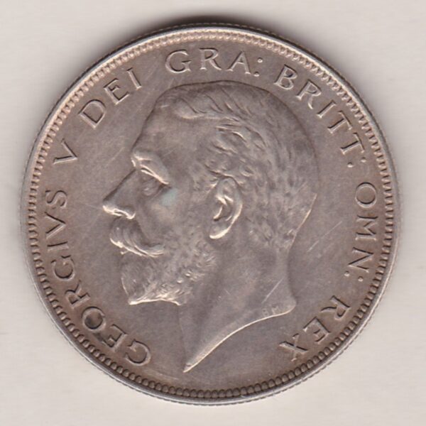 1935 Silver Halfcrown coin featuring the King George V on the Obverse. The Quartered shield of arms flanked by crowned royal cyphers complete the Reverse.