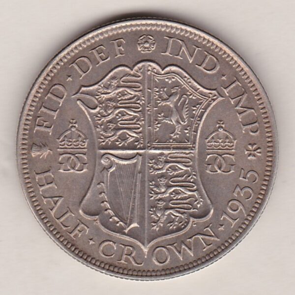 1935 Silver Halfcrown coin featuring the King George V on the Obverse. The Quartered shield of arms flanked by crowned royal cyphers complete the Reverse.