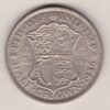 1936 Silver Halfcrown coin featuring the King George V on the Obverse. The Quartered shield of arms flanked by crowned royal cyphers complete the Reverse.