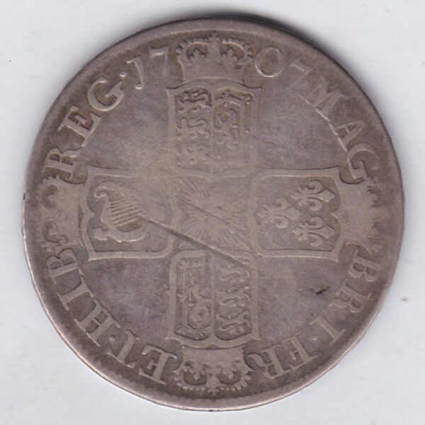 1707 E Silver Halfcrown coin with Queen Anne on the Obverse. Crowned cruciform shields with central Garter stars on the Reverse.