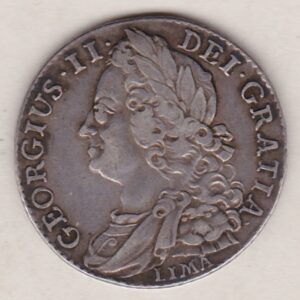 1745 LIMA silver shilling coin featuring a laureate and draped bust of George II. The crowned cruciform shields with central Garter star on the Reverse.