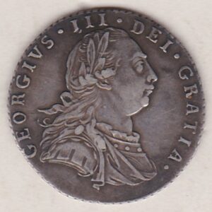 1787 silver sixpence coin featuring a laureate and draped bust of George III. The cruciform shields, with a semee of hearts on the Reverse.