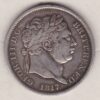 1817 Silver Shilling Coin featuring a laureate bust or 'bull head' of King George III on the Obverse. The crowned shield of royal arms on the Reverse.