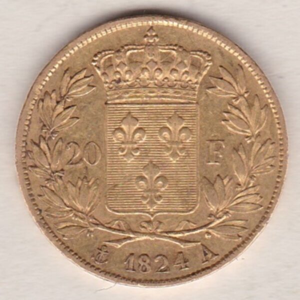 1824 A France Gold Twenty Francs coin featuring the portrait of Louis XVIII on the Obverse. The crowned shield of France on the Reverse.