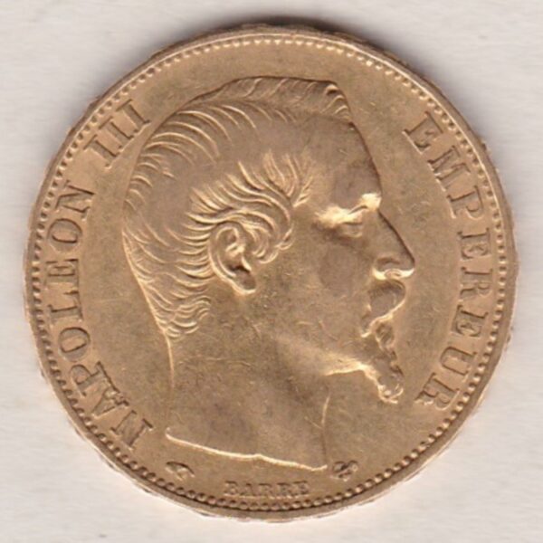 1856 A France Gold Twenty Francs coin featuring Napoleon III on the Obverse. The reverse has the denomination above the date within a wreath.