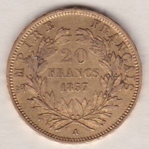 1857 A France Gold Twenty Francs coin featuring Napoleon III on the Obverse. The reverse has the denomination above the date within a wreath.