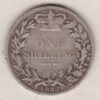 1882 silver shilling coin featuring Queen Victoria young head on the Obverse. The Reverse has a crown, laurel and oak leaves within an open wreath.