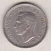 1952 Cupro Nickel Sixpence coin featuring the uncrowned portrait of King George VI. The reverse features the crowned royal cypher dividing the date.