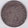 1663 Silver Crown Coin featuring the first bust of King Charles II on the Obverse and the crowned cruciform of shields on the reverse.