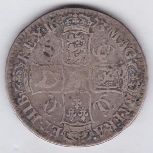 1673 Silver Crown Coin featuring the third bust of King Charles II on the Obverse and the crowned cruciform of shields on the reverse.