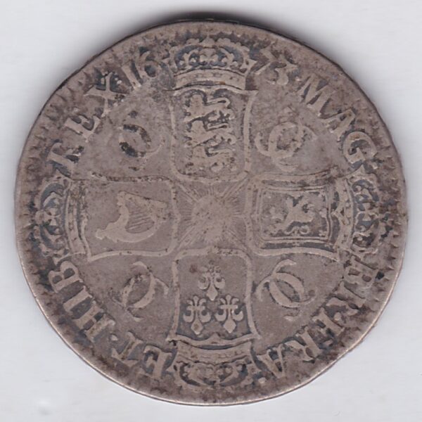 1673 Silver Crown Coin featuring the third bust of King Charles II on the Obverse and the crowned cruciform of shields on the reverse.