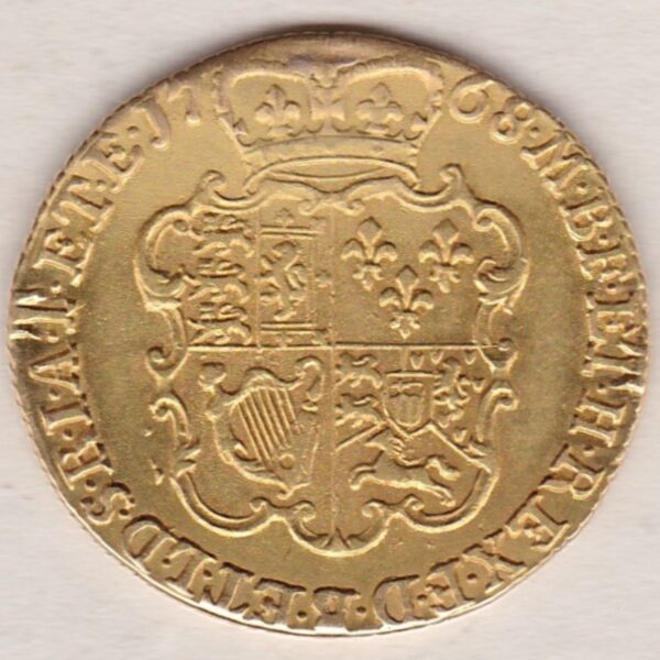 1768 Gold Guinea Coin featuring the third laureate head portrait of King George III on the obverse. The crowned quartered shield on the reverse.