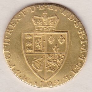 1792 Gold Guinea Coin featuring the fifth laureate head portrait of King George III on the obverse. The spade-shaped shield design is on the reverse.