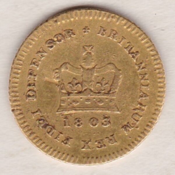 1803 Gold Third Guinea Coin featuring the laureate head portrait of King George III on the obverse. The reverse central crown with legend around and date.