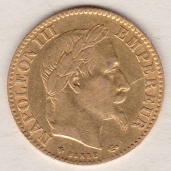 1867 BB France Gold Ten Francs coin featuring Napoleon III on the Obverse. A wreath of laurels, date and mint mark on the Reverse.