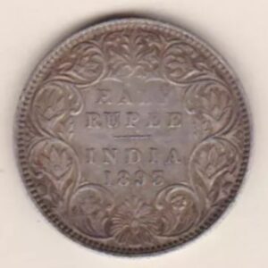 1893 B India Silver Half Rupee coin. The obverse features Queen Victoria. The reverse has the denomination and date within a wreath.