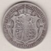 1911 Silver Halfcrown coin featuring king George V on the Obverse. The Reverse features a crowned quartered shield of arms.