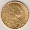 1933 - 34 Vatican City Gold One Hundred Lire coin featuring Pope Pius XI on the obverse. The figure of Christ is on the reverse.