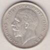 1934 Silver Halfcrown coin featuring the King George V on the Obverse. The Quartered shield of arms flanked by crowned royal cyphers complete the Reverse.