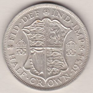 1934 Silver Halfcrown coin featuring the King George V on the Obverse. The Quartered shield of arms flanked by crowned royal cyphers complete the Reverse.