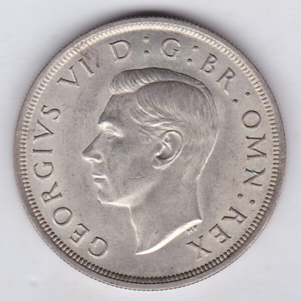 1937 Silver Crown Coin featuring the uncrowned portrait of King George VI on the obverse. A crowned quartered shield of arms on the reverse.