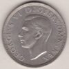 1937 Silver Halfcrown coin featuring the King George VI on the Obverse. The Quartered shield of arms flanked by crowned royal cyphers complete the Reverse.