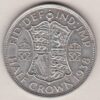 1938 Silver Halfcrown coin featuring the King George VI on the Obverse. The Quartered shield of arms flanked by crowned royal cyphers complete the Reverse.