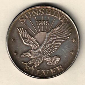 1985 Silver One Ounce Sunshine Minting. This round does feature an Eagle in flight. This round contains one ounce of .999 fine silver.