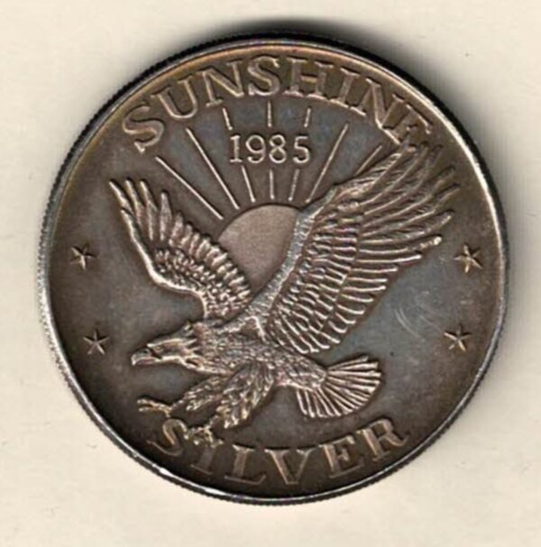 1985 Silver One Ounce Sunshine Minting. This round does feature an Eagle in flight. This round contains one ounce of .999 fine silver.