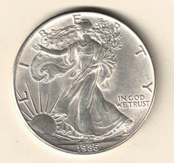 1986 Silver USA One Ounce Eagle. The liberty is on the obverse, The eagle is on the reverse. The coin contains one ounce of 999 fine silver.